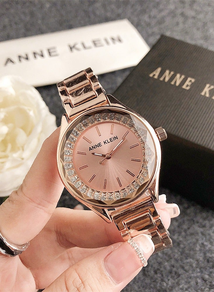 Anne Klein Women's Tonneau Quartz Zircon Rose Gold Fashion Watch with Rose Gold Stainless Steel Strap